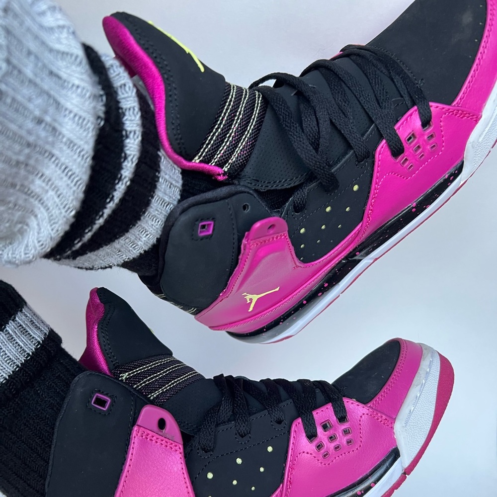 Girls Jordan SC-1 sneakers.